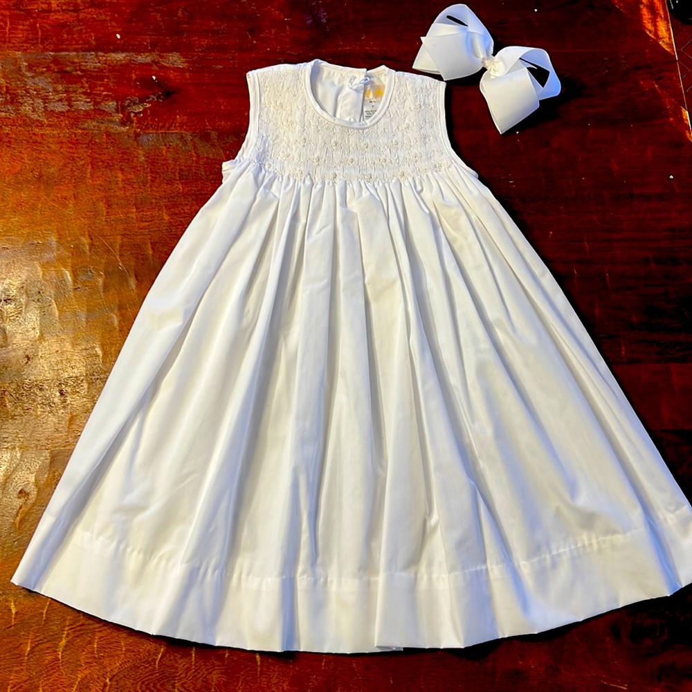 Smocked white Petit Ami dress
